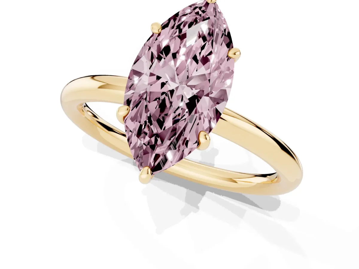 Fancy Pink Oval Cut Solitaire Diamond Ring with Four-Prong Setting on a Plain Band Yellow gold