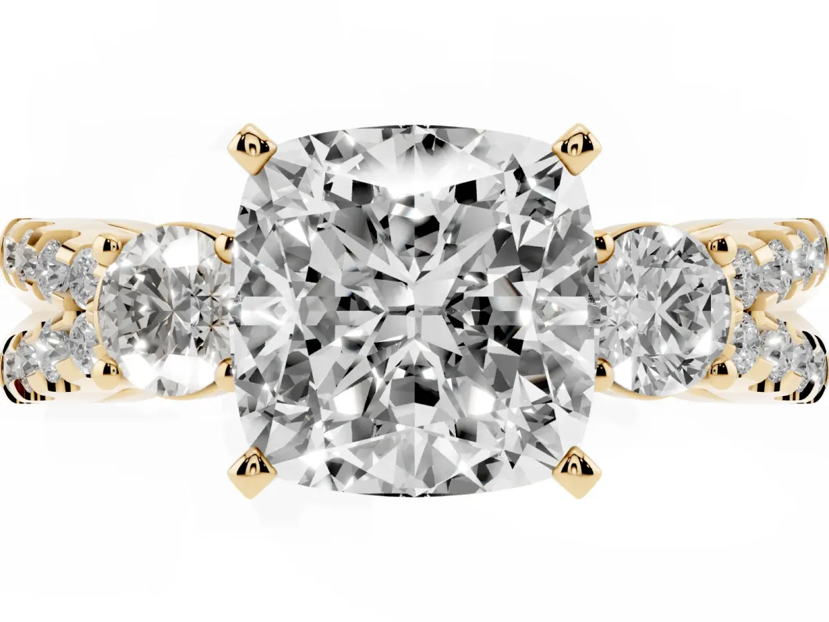 Cushion Cut Diamond Three-Stone Ring with Pavé Split Shank and Four-Prong Setting Yellow gold