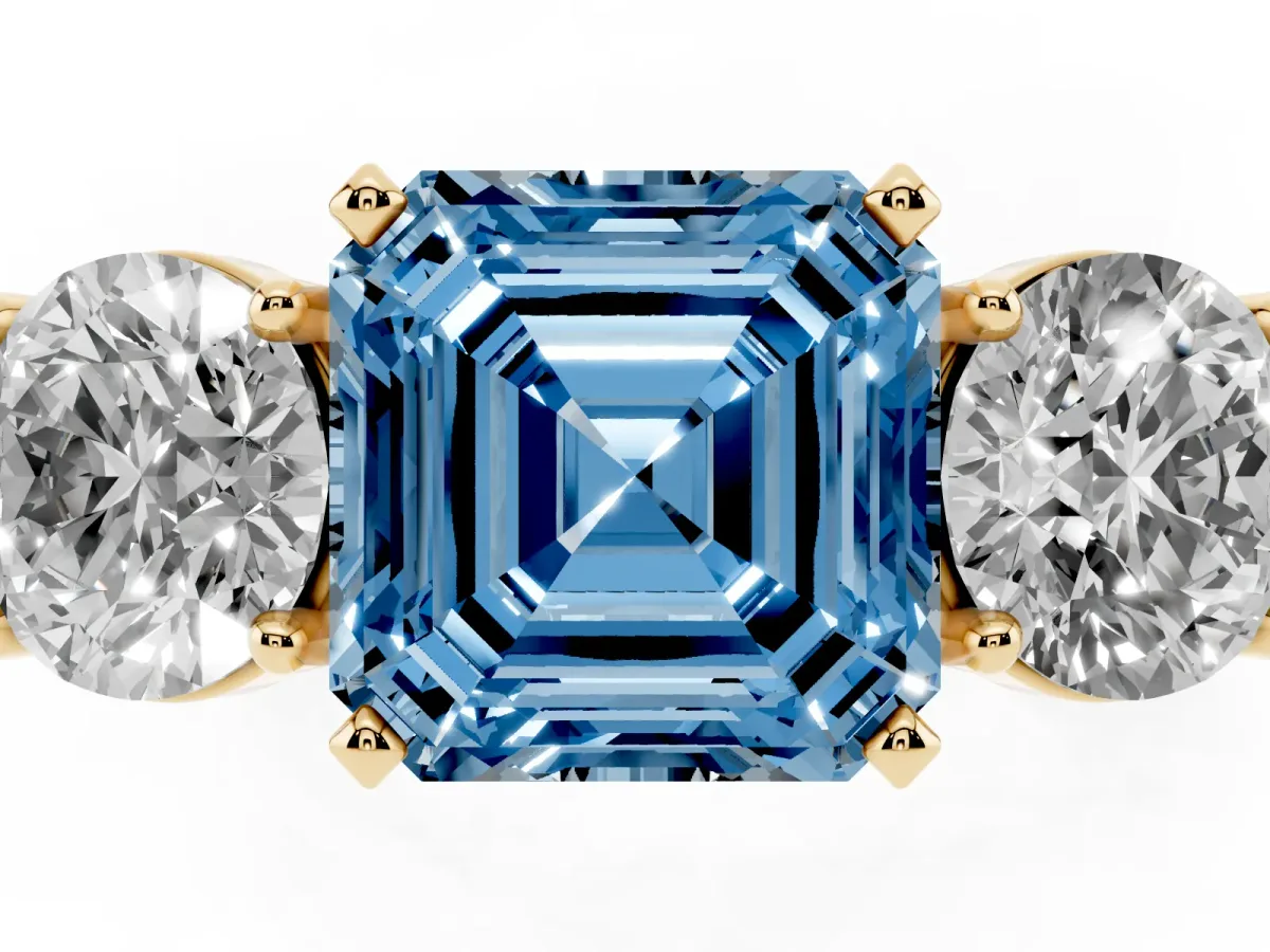 Fancy Blue Three-Stone Asscher Cut Diamond Ring with Round Side Stones, Classic Band, and Four-Prong Setting Yellow gold