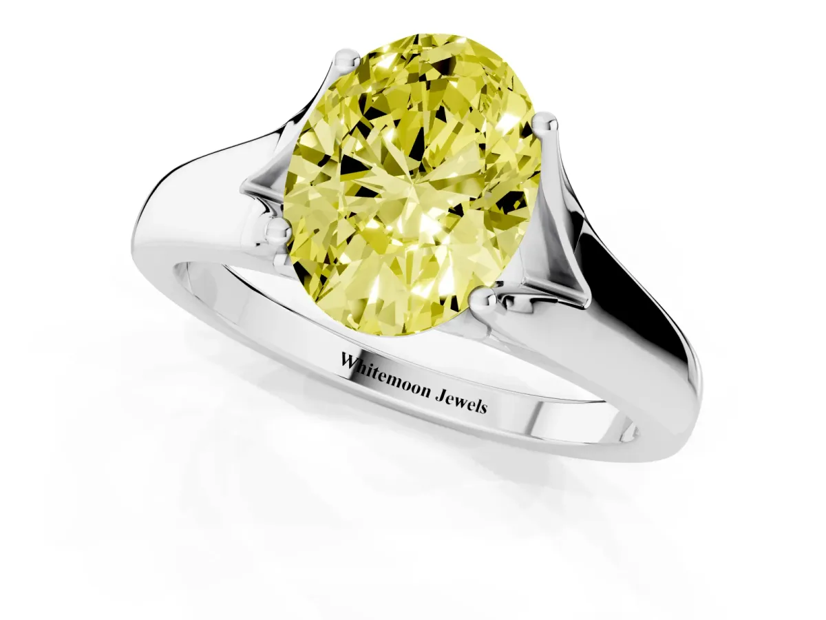 Fancy Yellow Oval Cut Solitaire Diamond Ring with Cathedral Band and Four-Prong Setting Silver