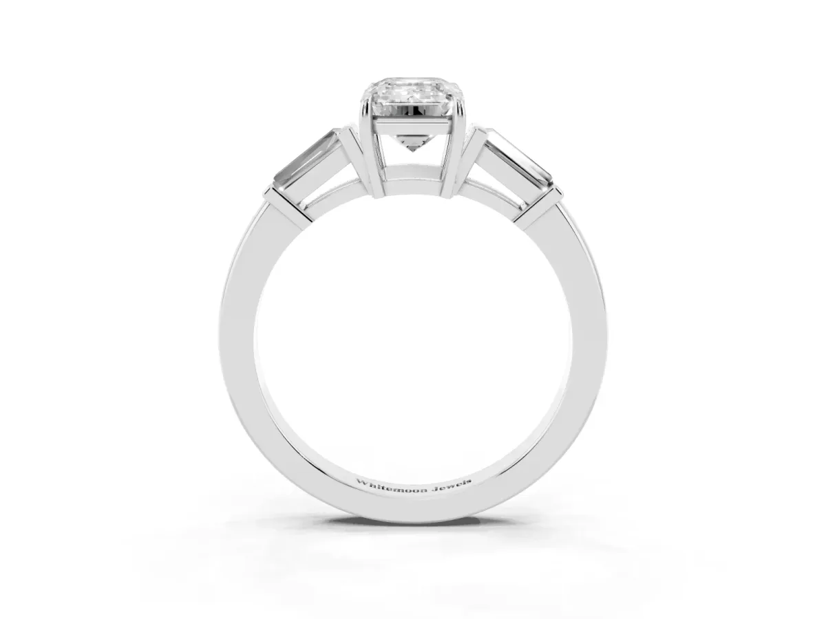 Emerald Cut Diamond Three-Stone Ring with Tapered Baguette Side Stones and Prong Setting White gold