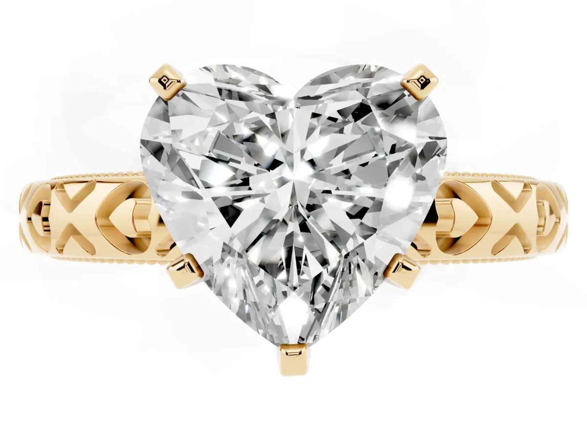 Heart Cut Solitaire Diamond Engagement Ring with XO Engraved Band and Four-Prong Setting Yellow gold