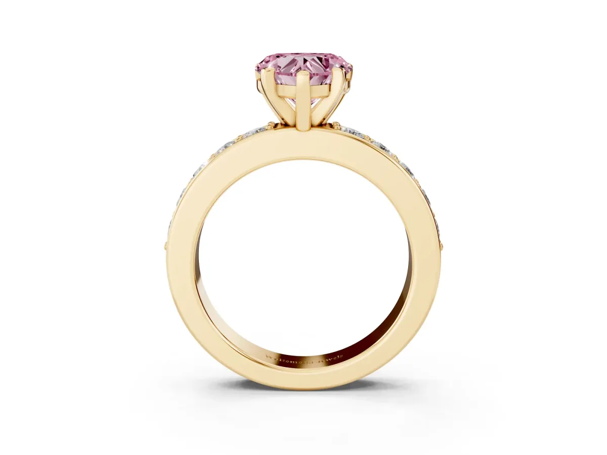 Fancy Pink Heart Cut Diamond Engagement Ring with Channel Set Round Band and Prong Setting Yellow gold