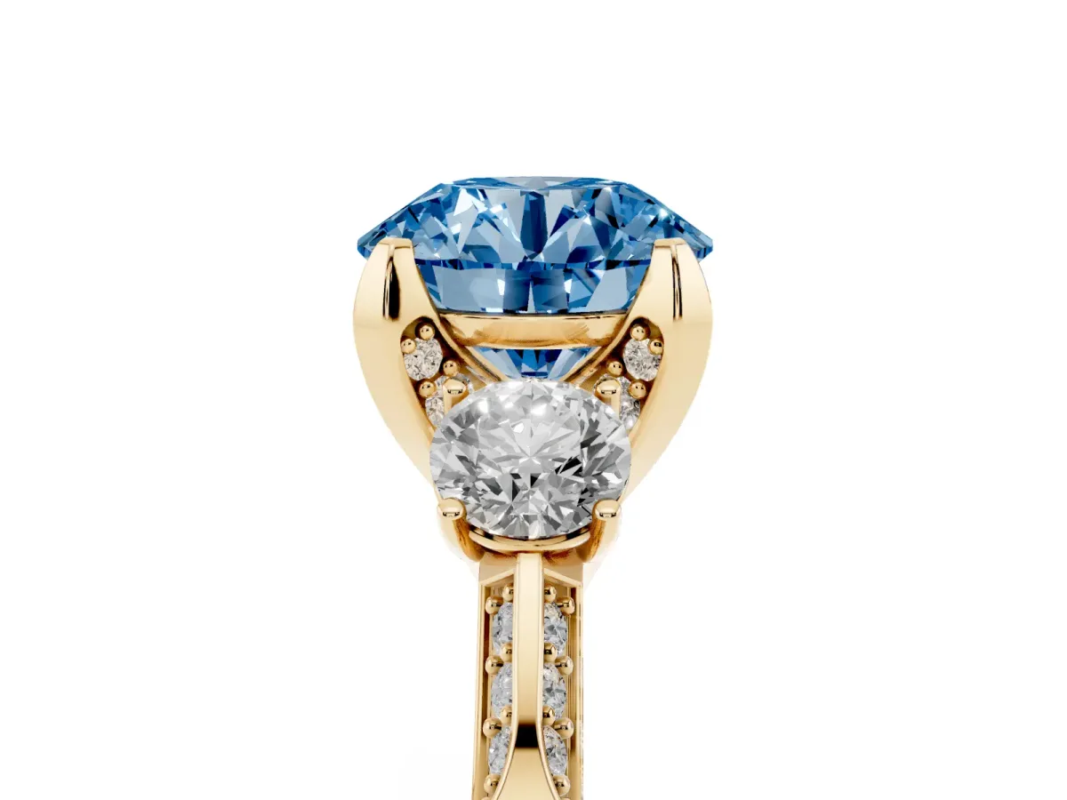 Fancy Blue Round Cut Brilliant Three-Stone Diamond Ring with Pavé Band and Four-Prong Setting Yellow gold