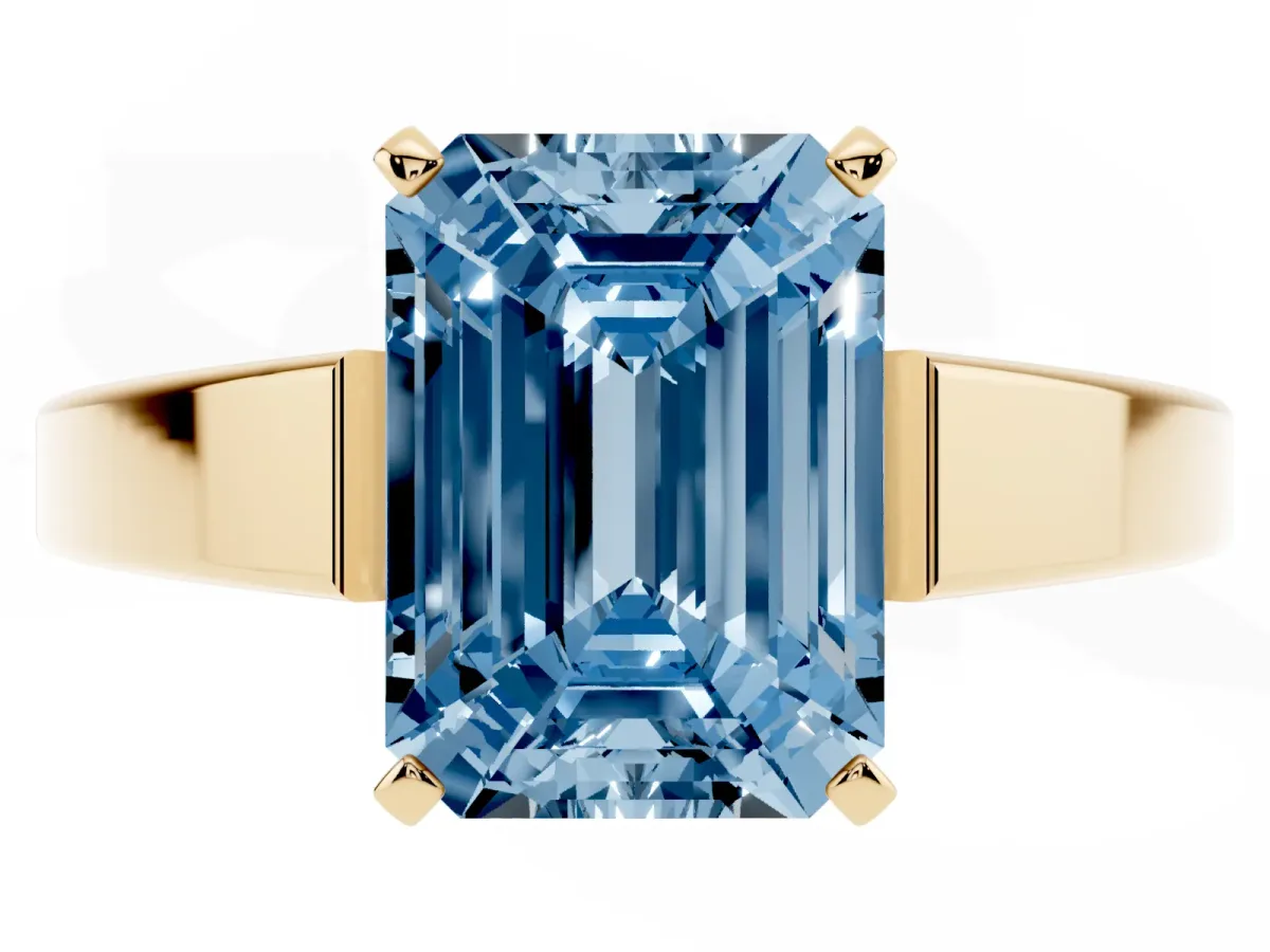 Fancy Blue Emerald Cut Solitaire Engagement Ring with Four-Prong Setting and Tapered Band Yellow gold