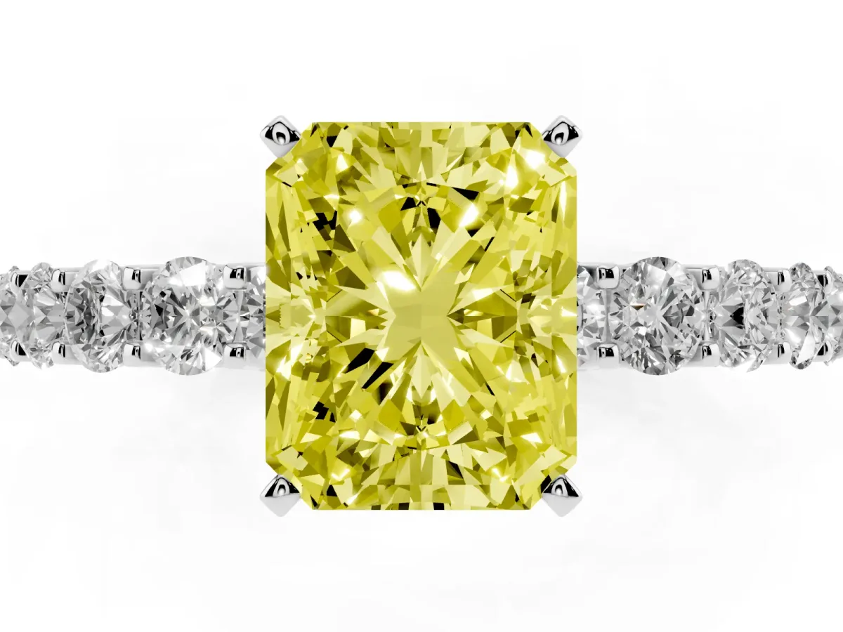 Fancy Yellow Radiant Cut Diamond Solitaire Ring with Shared Prong Pavé Band and Four-Prong Setting Platinum