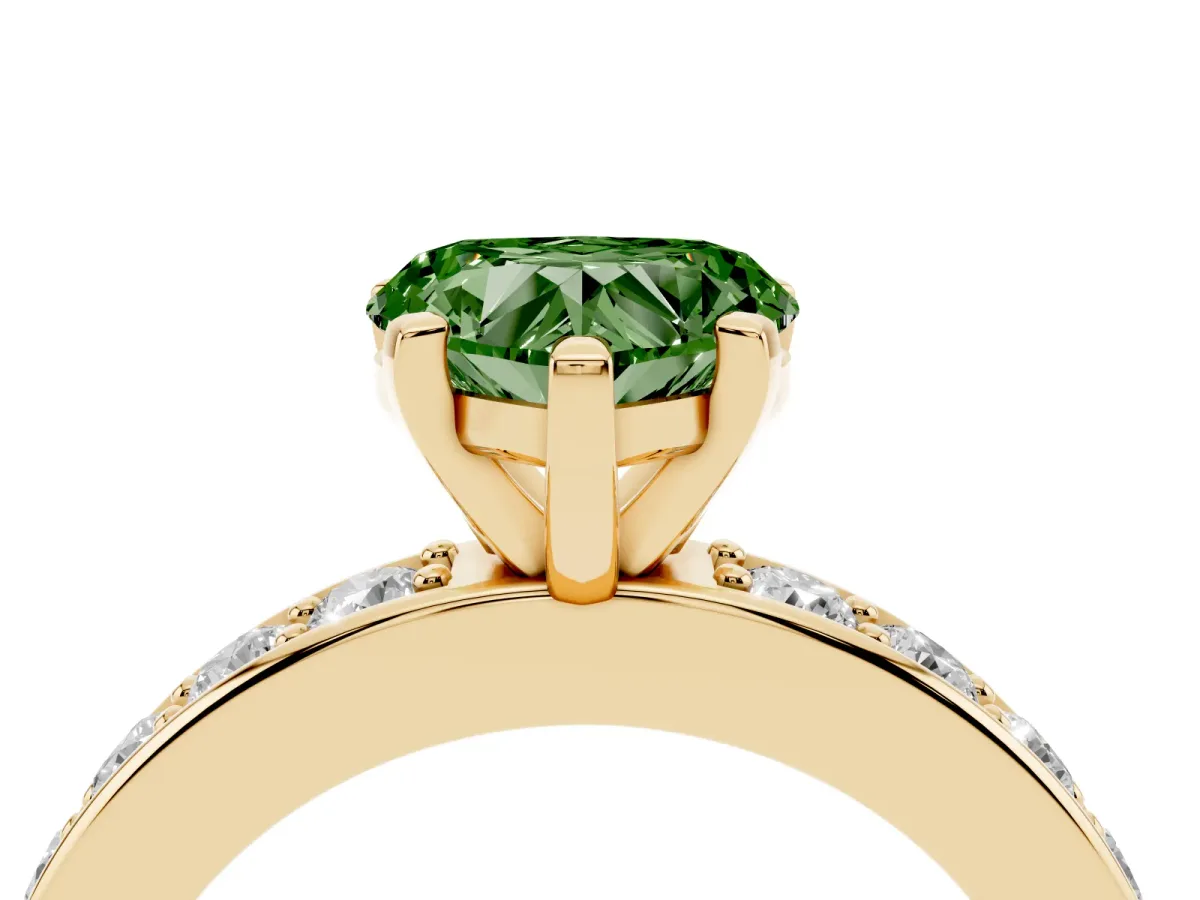 Fancy Green Heart Cut Diamond Engagement Ring with Channel Set Round Band and Prong Setting Yellow gold