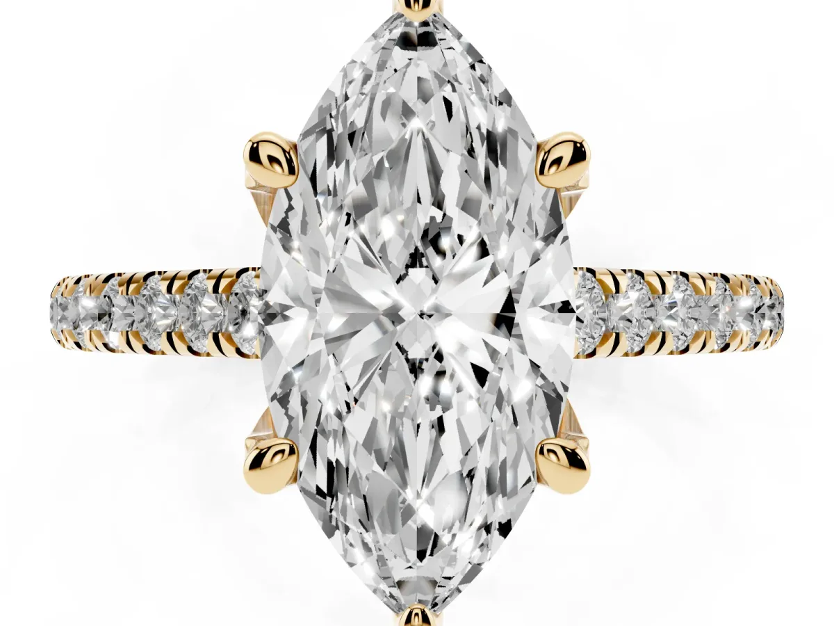 Marquise Cut Brilliant Diamond Solitaire with Pavé Band and Four-Prong Setting Yellow gold