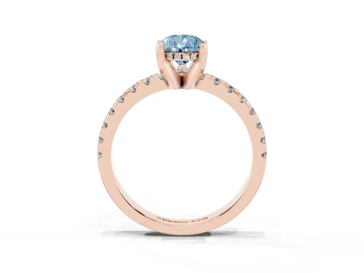 Fancy Blue Pear Cut Diamond Solitaire Ring with Round Pavé Band and Four-Prong Setting Rose gold