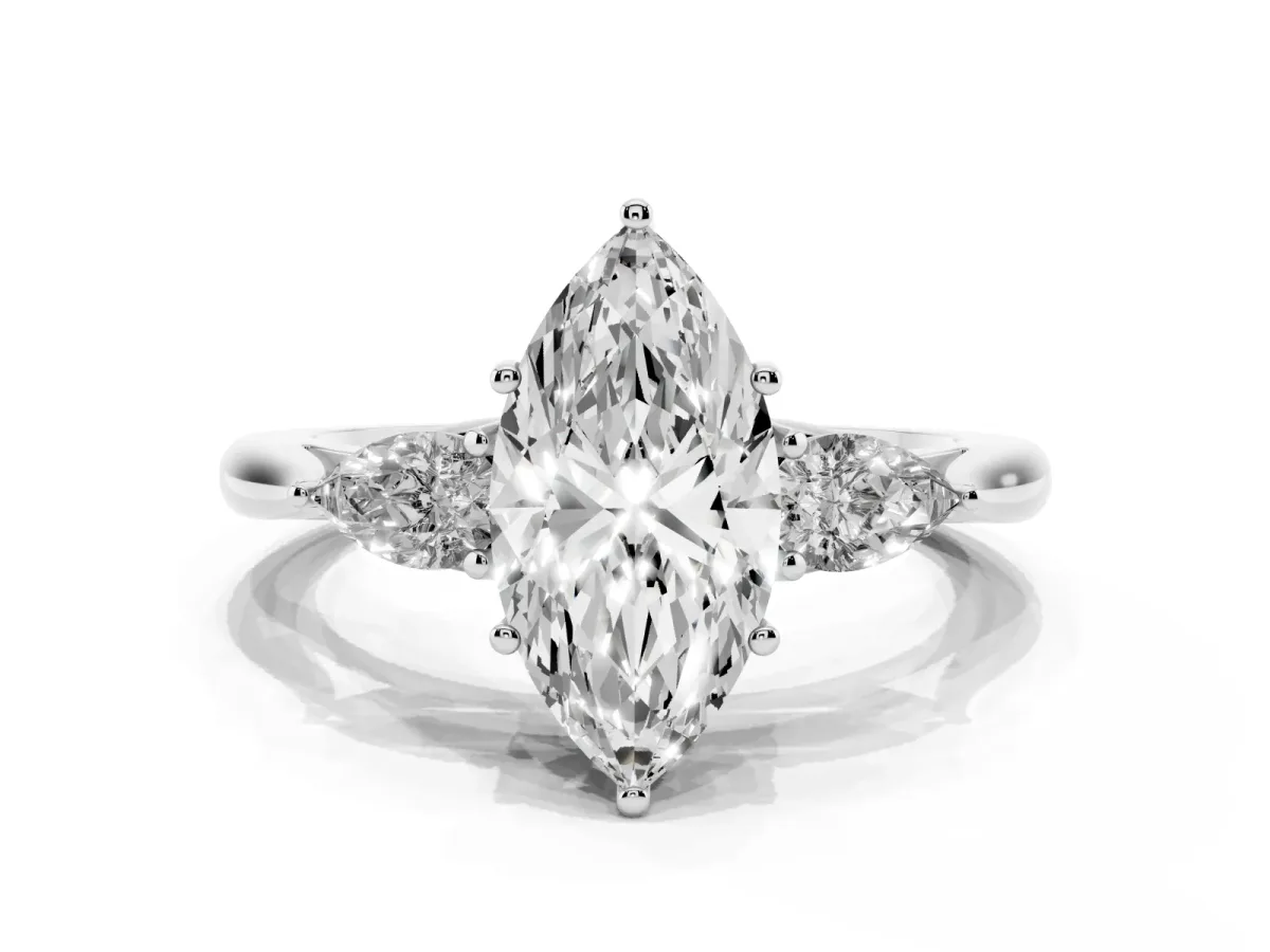 Three-Stone Marquise Cut Diamond Ring with Pear Side Stones in Four-Prong Setting Platinum