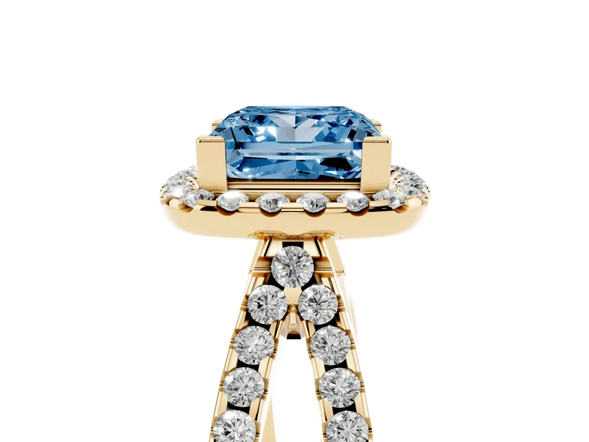 Fancy Blue Princess Cut Diamond Halo Ring with Split Shank Pavé Band and Prong Setting Yellow gold