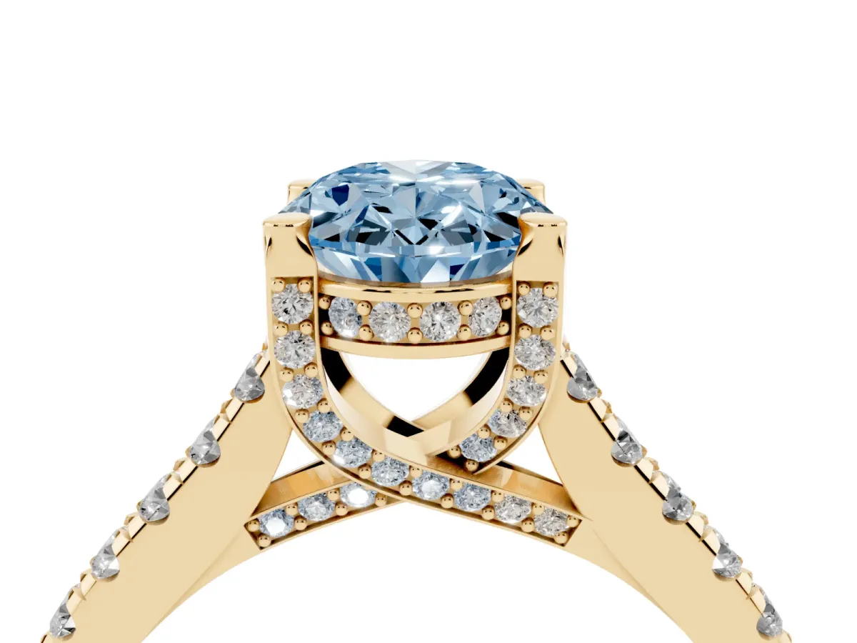 Fancy Blue Oval Cut Brilliant Diamond Solitaire with Pavé Band and Four-Prong Setting Yellow gold