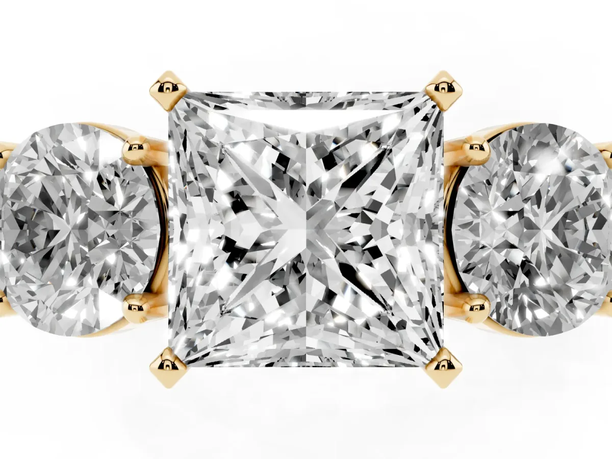 Three-Stone Princess Cut Diamond Ring with Round Side Stones, Classic Band, and Four-Prong Setting Yellow gold