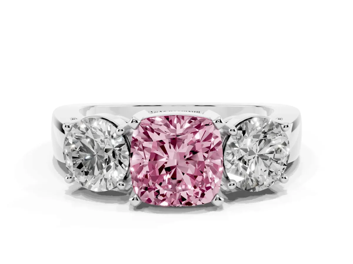 Fancy Pink Three-Stone Cushion Cut Diamond Ring with Round Side Stones, Classic Band, and Four-Prong Setting White gold