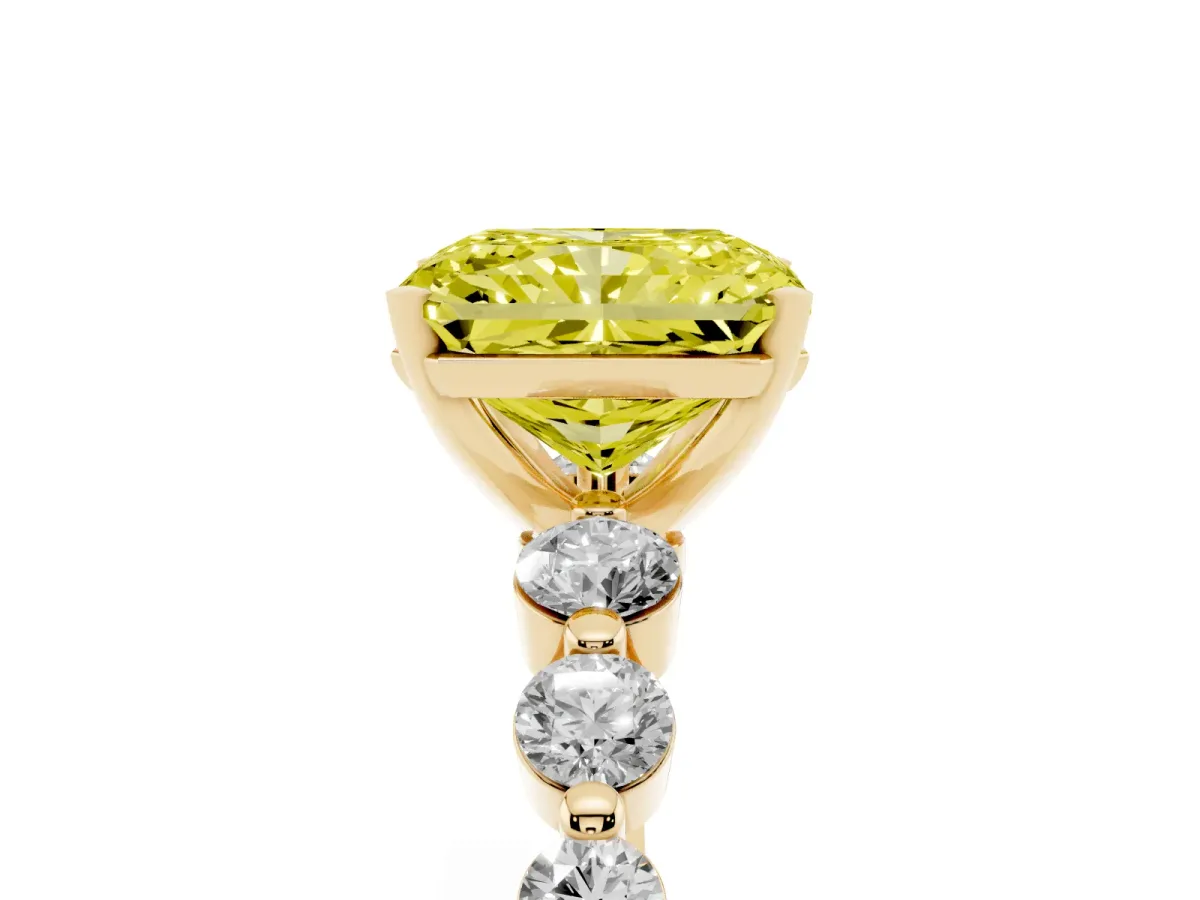 Fancy Yellow Radiant Cut Solitaire Diamond Ring with Pave Band and Four-Prong Setting Yellow gold