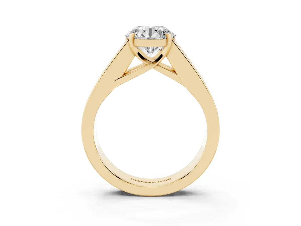 Round Cut Cut Channel Set Solitaire Ring with Four-Prong Setting Yellow gold