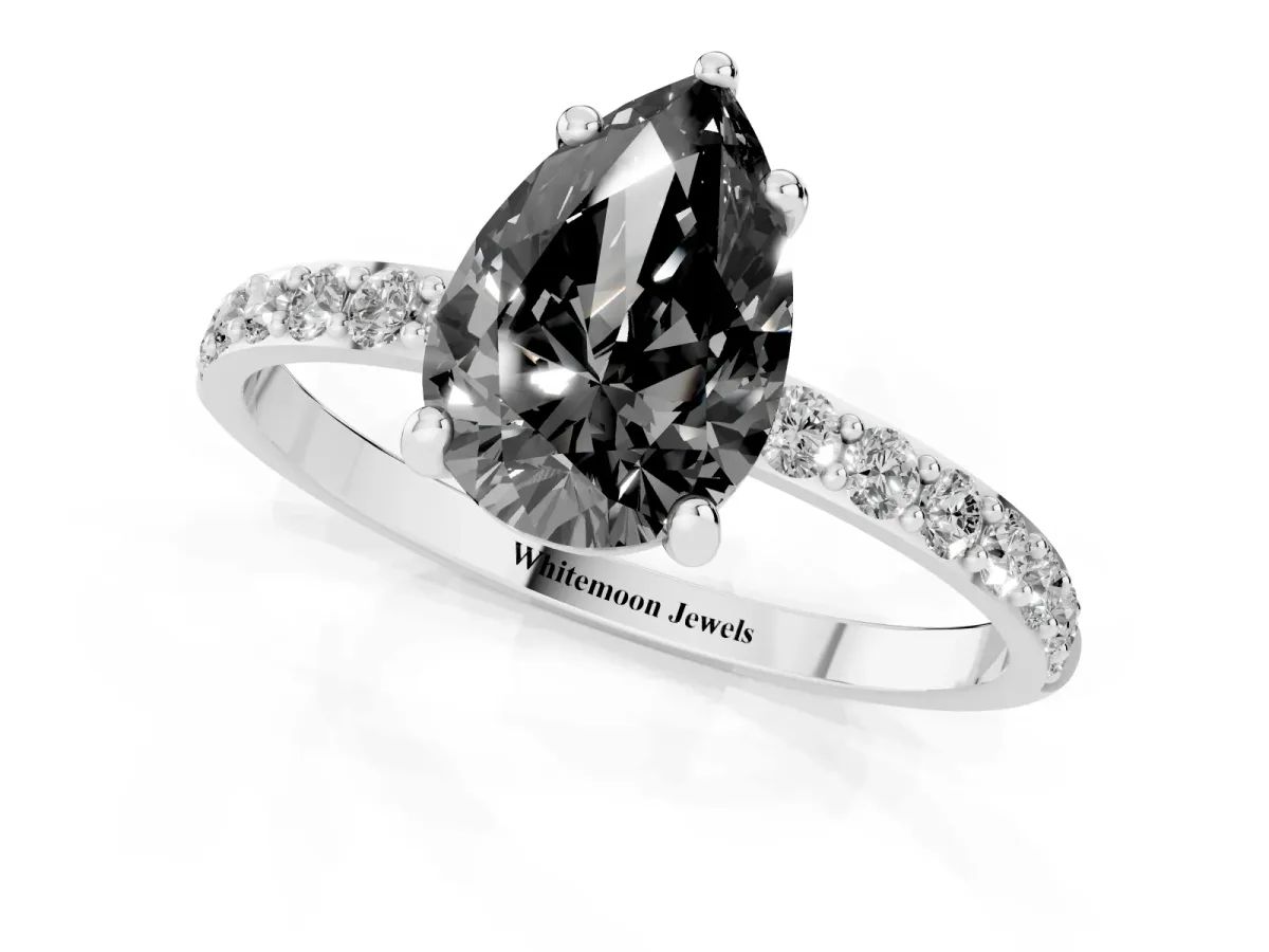 Fancy Black Pear Cut Diamond Solitaire Ring with Round Pavé Band and Prong Setting Platinum
