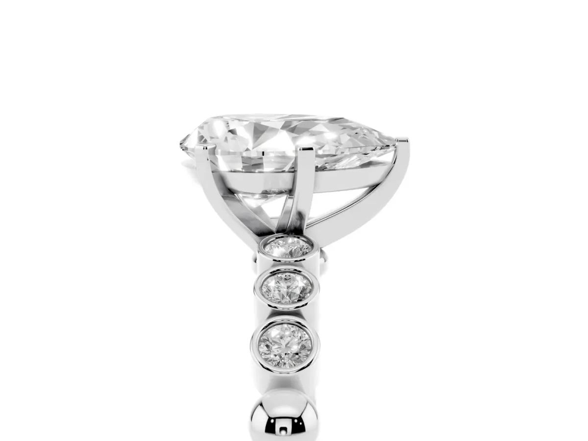 Pear Cut Solitaire Bezel Accent Diamond Engagement Ring with Beaded Band and Four-Prong Setting Platinum