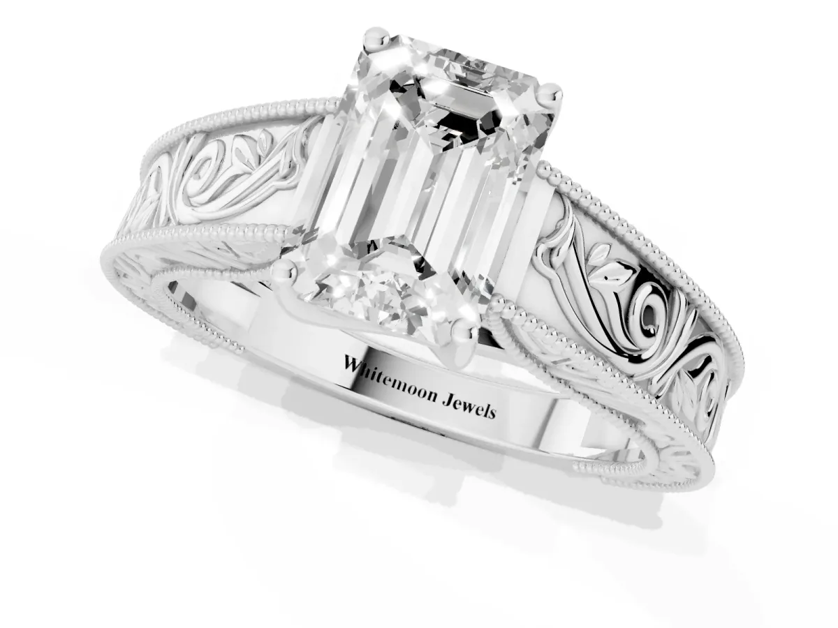 Emerald Cut Diamond Solitaire Ring with Engraved Band and Four-Prong Setting Platinum