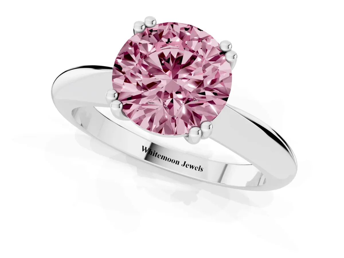 Fancy Pink Round Cut Cut Solitaire Engagement Ring with Tapered Band and Four-Prong Setting Silver
