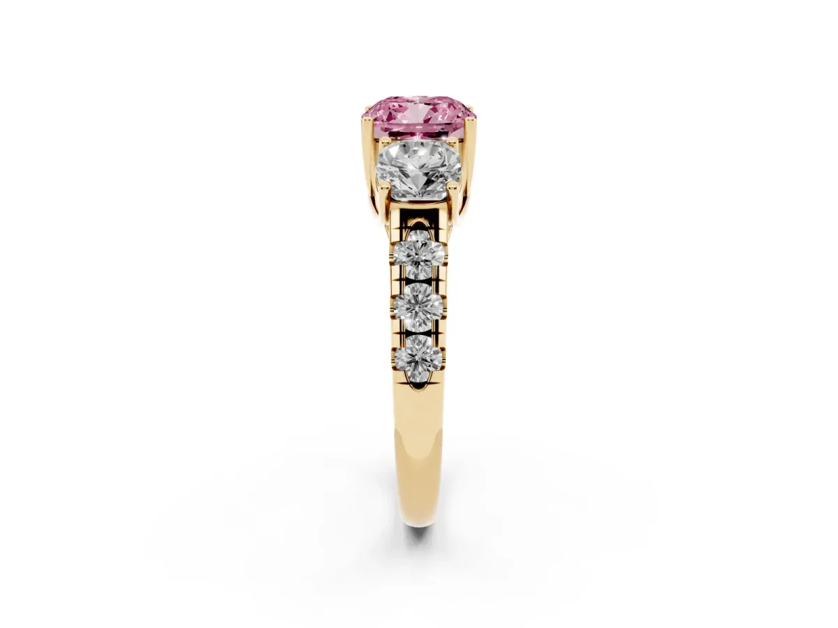 Fancy Pink Three-Stone Cushion Cut Diamond Pavé Band with Prong Setting Yellow gold