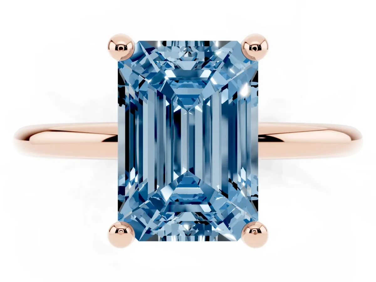 Fancy Blue Emerald Cut Solitaire Diamond Ring with 4-Prong Setting on a Classic Band Rose gold