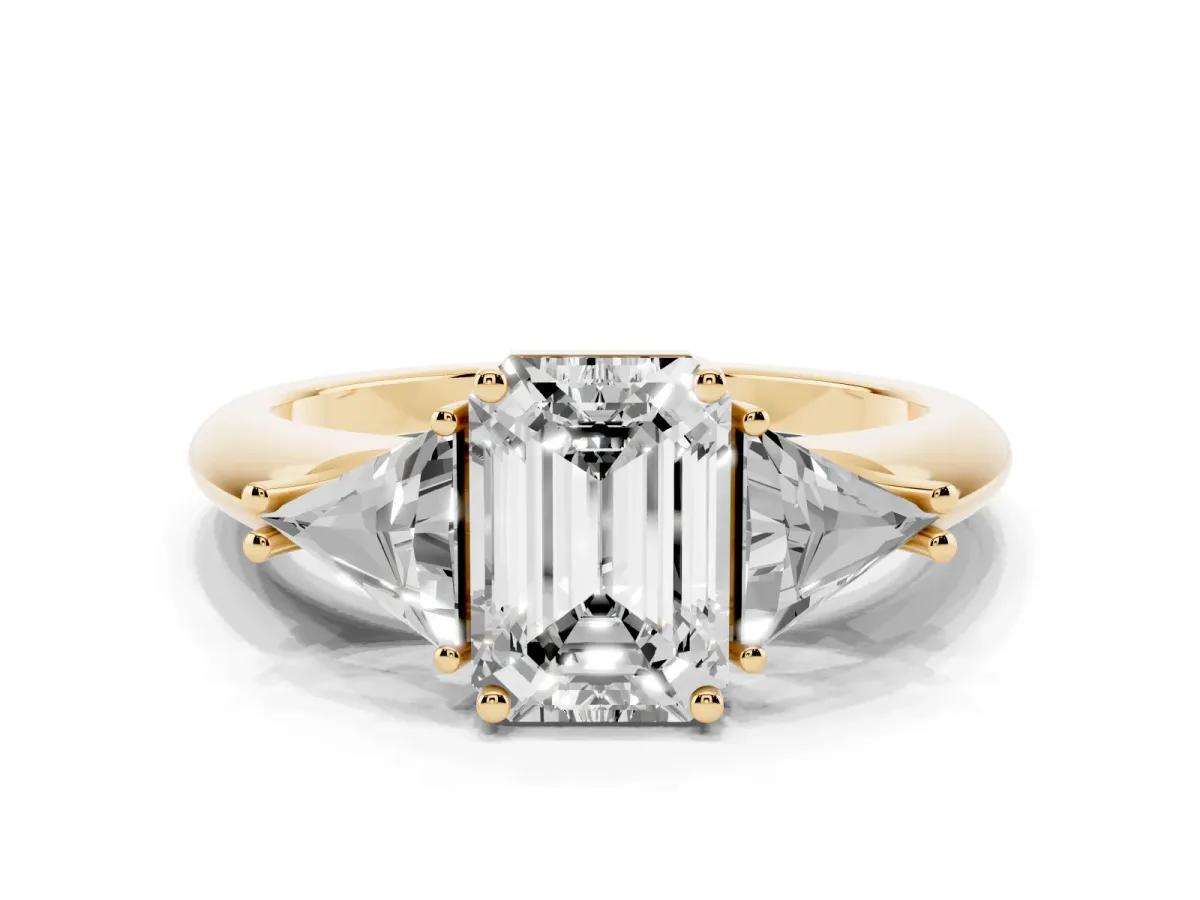 Three-Stone Emerald Cut Diamond Engagement Ring with Trillion Side Stones and Prong Setting Yellow gold