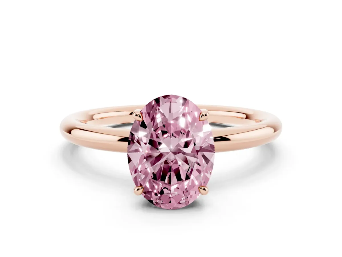 Fancy Pink Oval Cut Diamond Solitaire Ring with Thin Band and Four-Prong Setting Rose gold