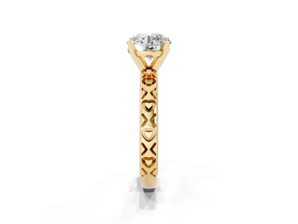 Round Cut Solitaire Diamond Engagement Ring with XO Engraved Band and Four-Prong Setting Yellow gold