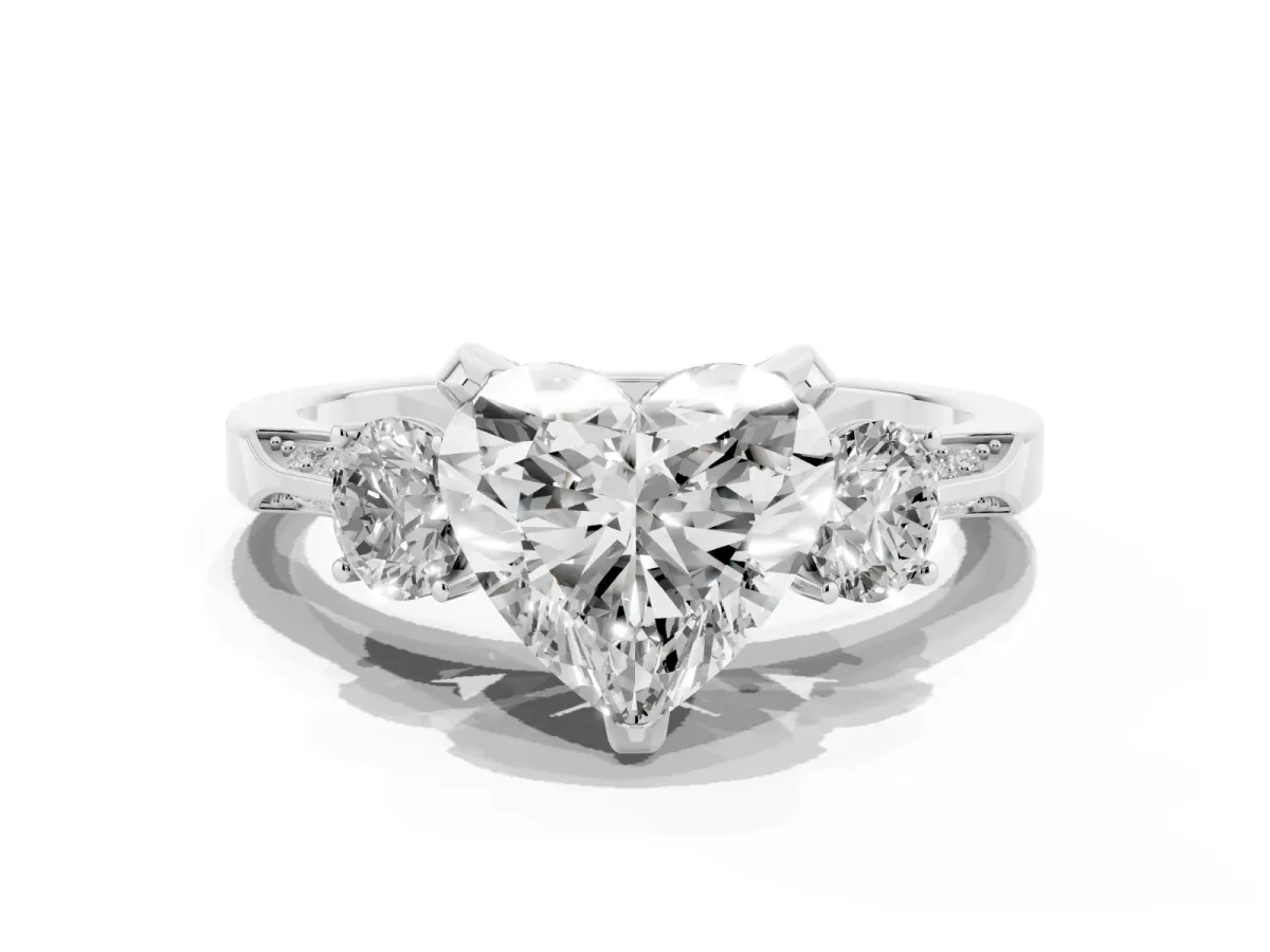 Heart Cut Brilliant Three-Stone Diamond Ring with Pavé Band and Four-Prong Setting Platinum
