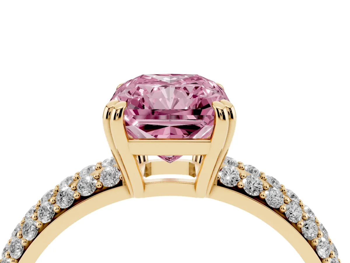 Fancy Pink Radiant Cut Diamond Solitaire Ring with Multi-Row Round Pavé Band and Prong Setting Yellow gold