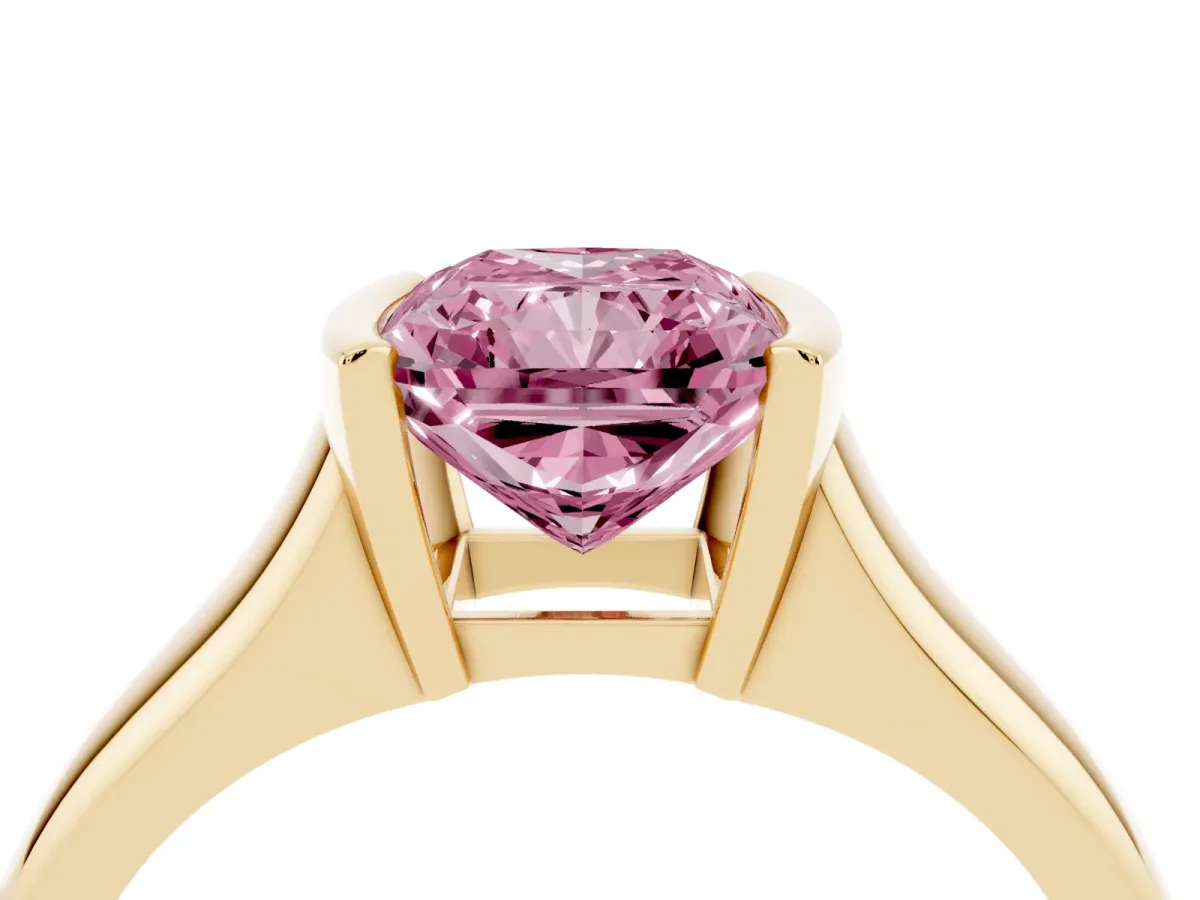 Fancy Pink Radiant Cut Solitaire Tension Set Diamond Ring with Split Shank Band Yellow gold