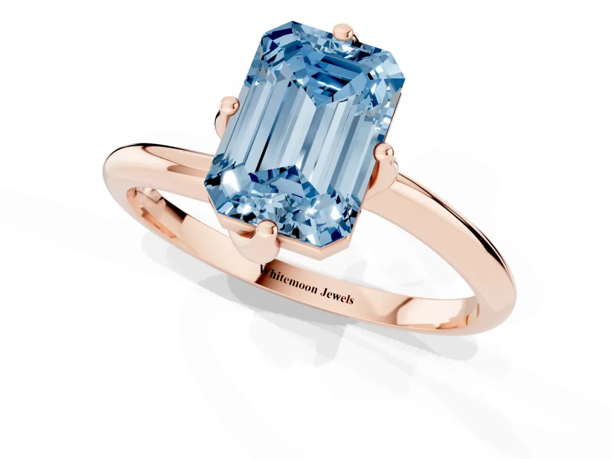 Fancy Blue Emerald Cut Diamond Solitaire Engagement Ring with Four-Prong Setting and Classic Band Rose gold
