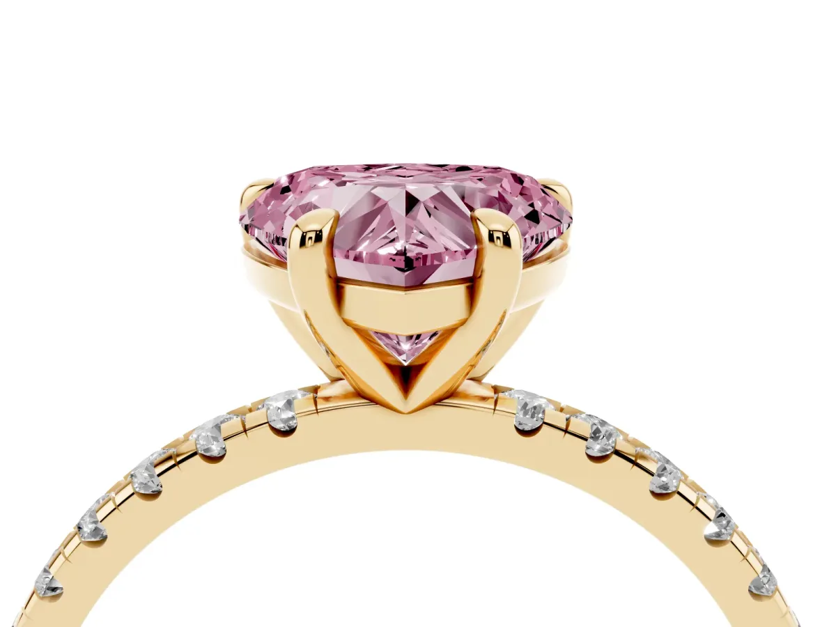 Fancy Pink Heart Cut Diamond Brilliant Solitaire Ring with Pavé Band and Four-Prong Setting Yellow gold