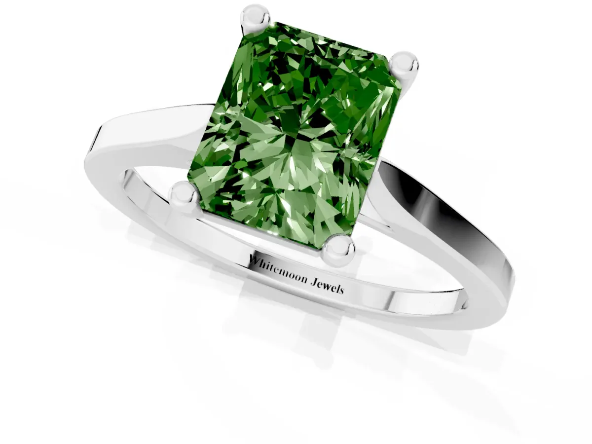 Fancy Green Radiant Cut Solitaire Diamond Ring with Four-Prong Setting and Tapered Band Silver