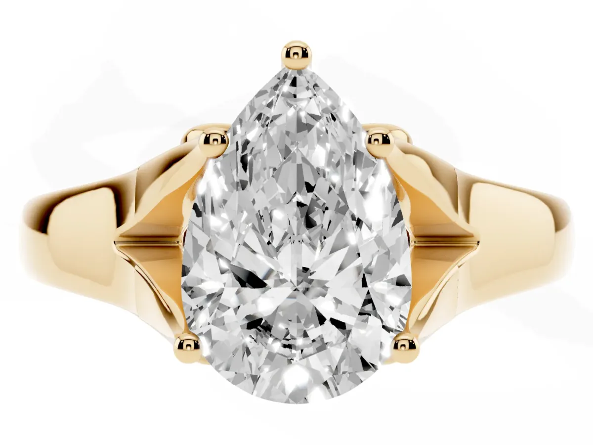 Pear Cut Solitaire Diamond Ring with Cathedral Band and Four-Prong Setting Yellow gold