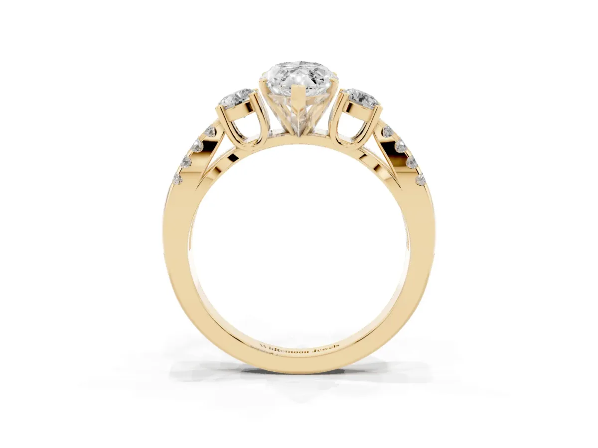 Marquise Cut Diamond Three-Stone Ring with Pavé Split Shank and Four-Prong Setting Yellow gold