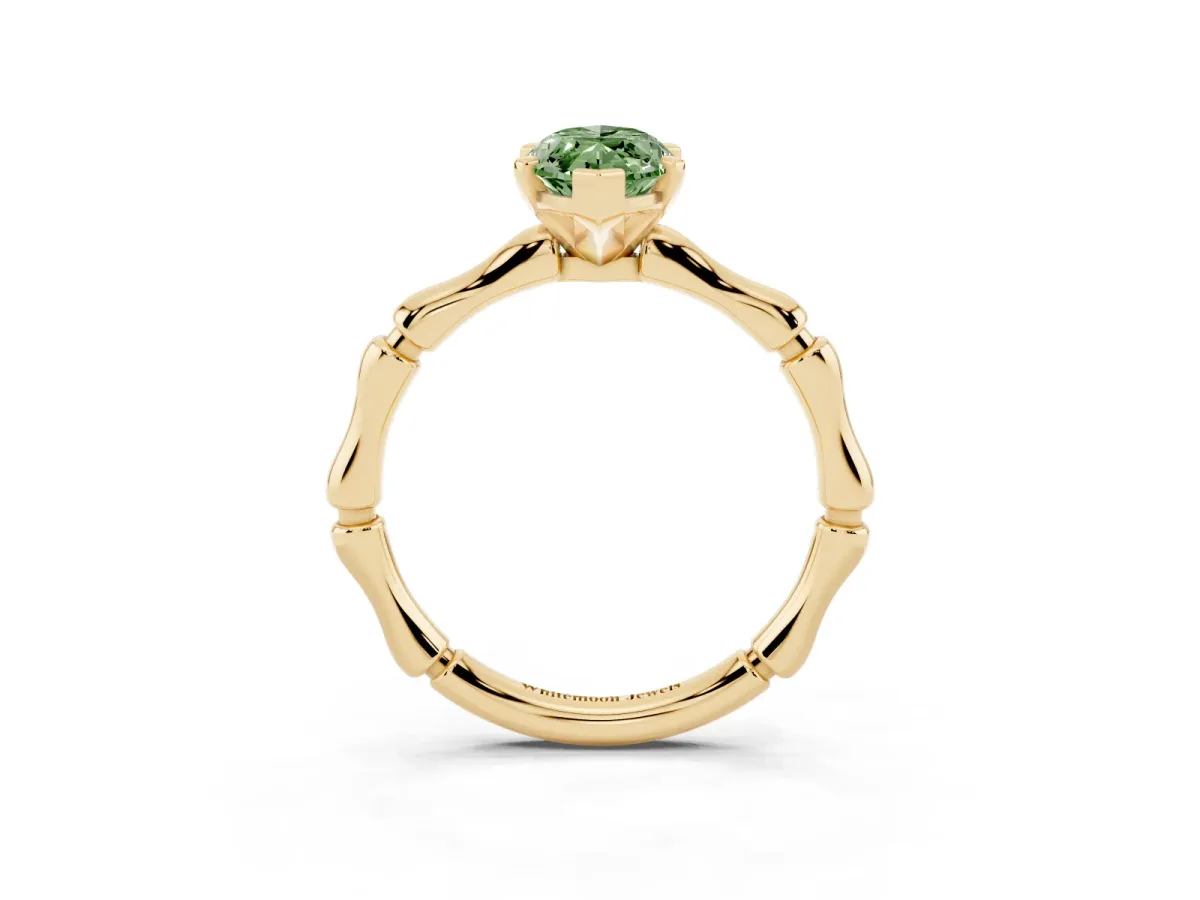 Fancy Green Marquise Cut Solitaire Diamond Ring with Bamboo Band and Four-Prong Setting Yellow gold