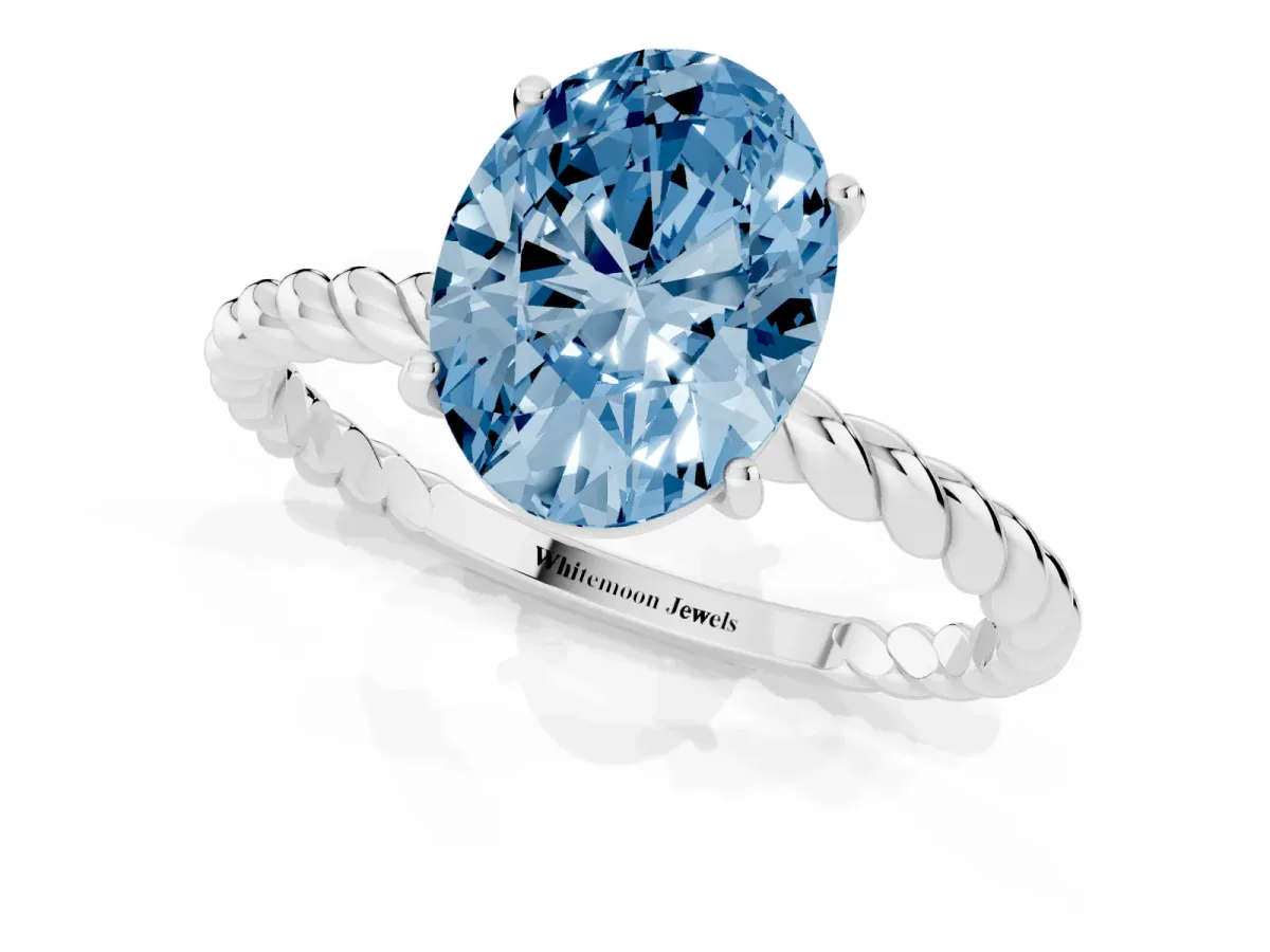 Fancy Blue Oval Cut Solitaire Twisted Band 4-Prong Ring Silver