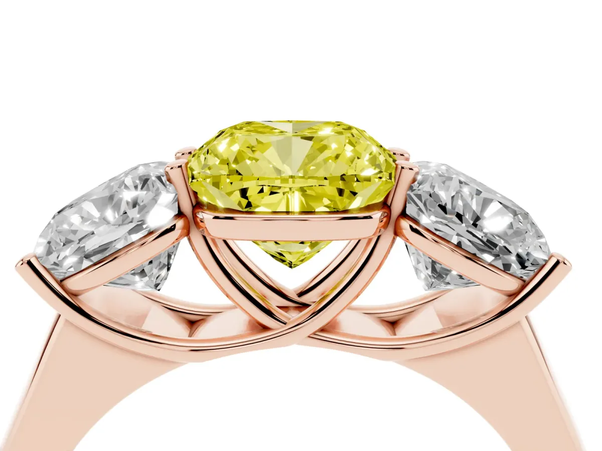 Fancy Yellow Cushion Cut Three-Stone Diamond Ring with Prong Setting on a Classic Band Rose gold