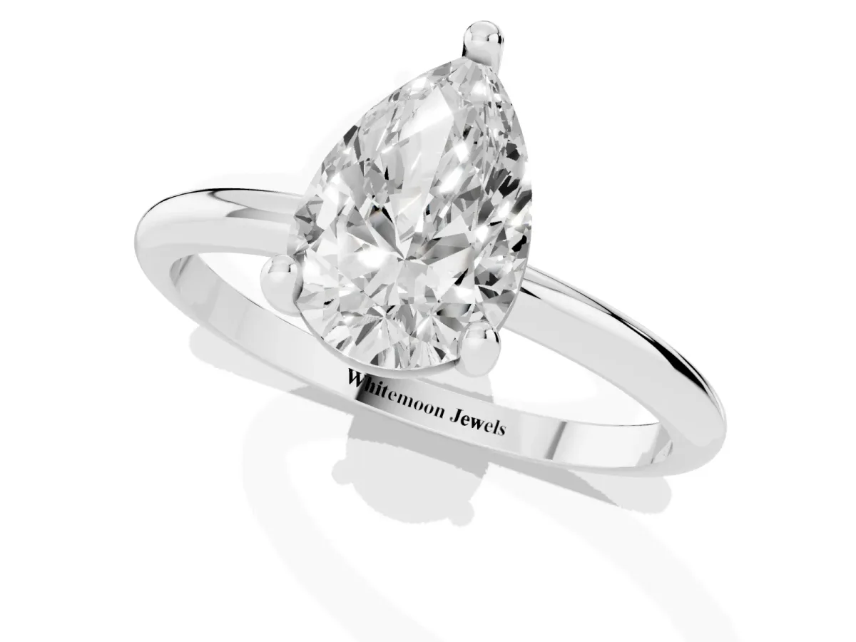 Pear Cut Solitaire Diamond Ring with 4-Prong Setting on a Classic Band White gold