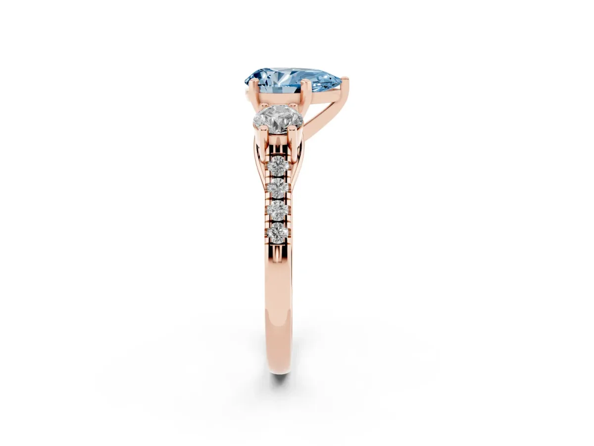 Fancy Blue Three-Stone Pear Cut Diamond Pavé Band with Four-Prong Setting Rose gold