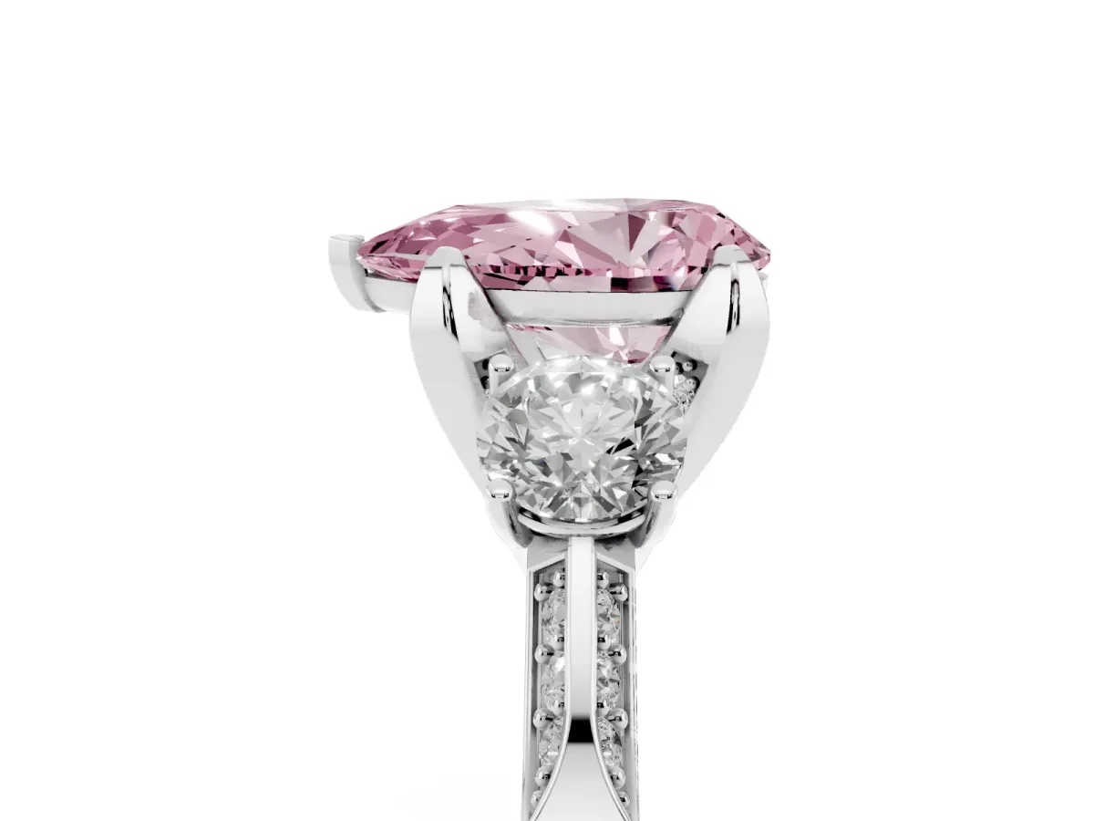 Fancy Pink Pear Cut Brilliant Three-Stone Diamond Ring with Pavé Band and Four-Prong Setting Silver
