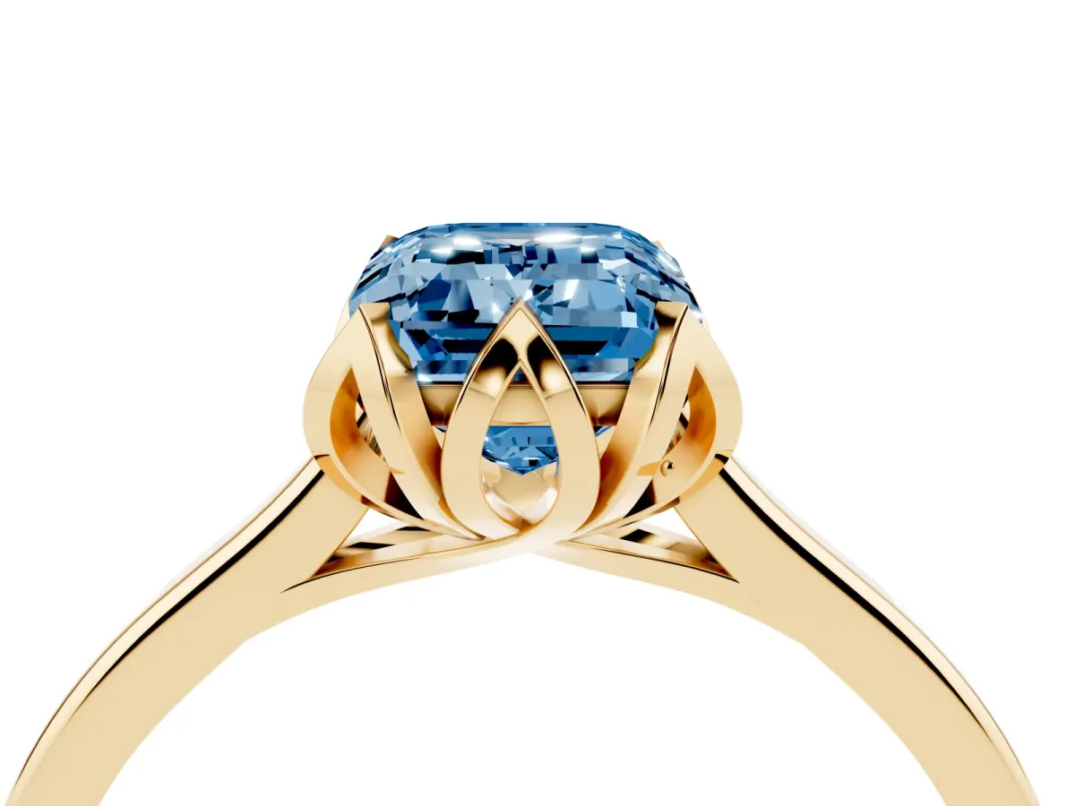 Fancy Blue Emerald Cut Diamond Solitaire Ring with Flower Prong Setting and Classic Band Yellow gold