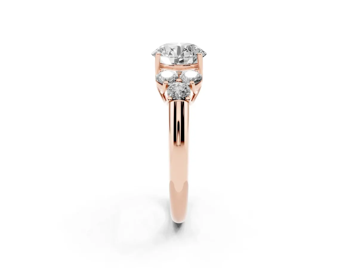 Round Cut Cut Diamond Cluster Ring with Round Accent Stones and Prong Setting on a Classic Band Rose gold