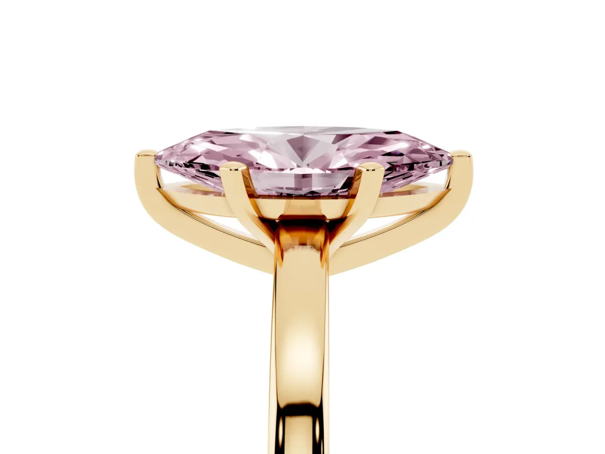 Fancy Pink Marquise Cut Solitaire Diamond Engagement Ring with Four-Prong Setting on a Classic Band Yellow gold