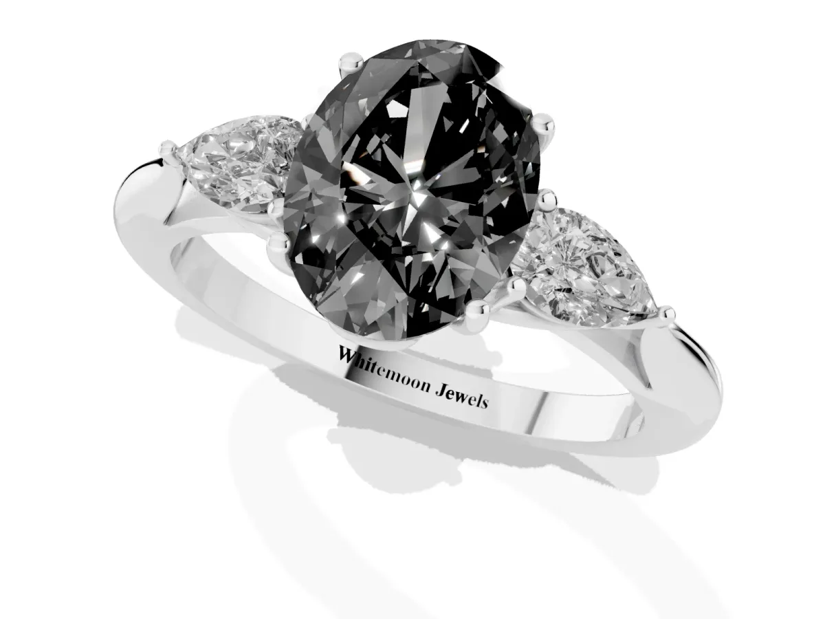 Fancy Black Three-Stone Oval Cut Brilliant Diamond Solitaire Ring with Tapered Band and Four-Prong Setting Silver