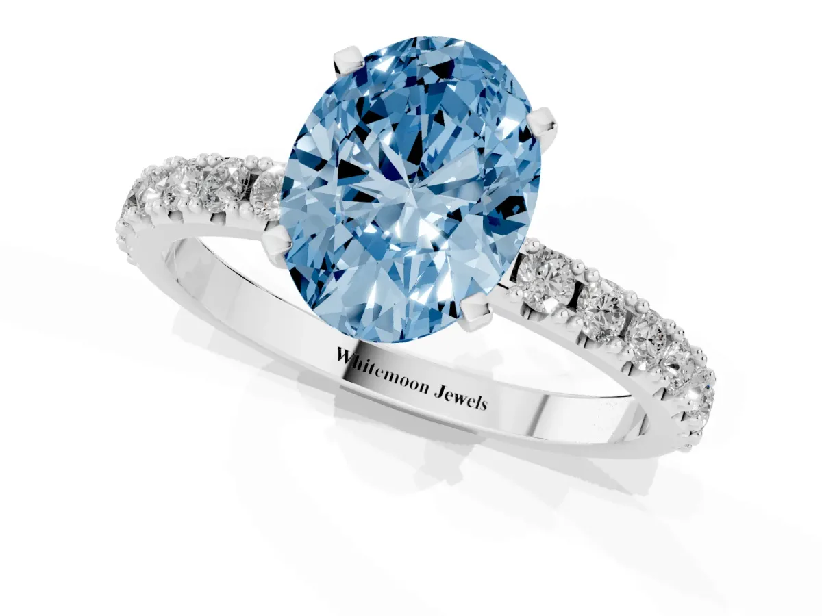 Fancy Blue Oval Cut Diamond Solitaire Pavé Band with Four-Prong Setting Silver