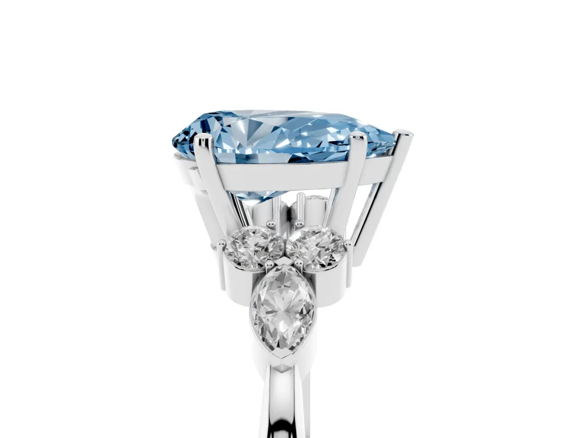 Fancy Blue Pear Cut Brilliant Diamond Solitaire Ring with Pear Side Stones and Four-Prong Setting Silver