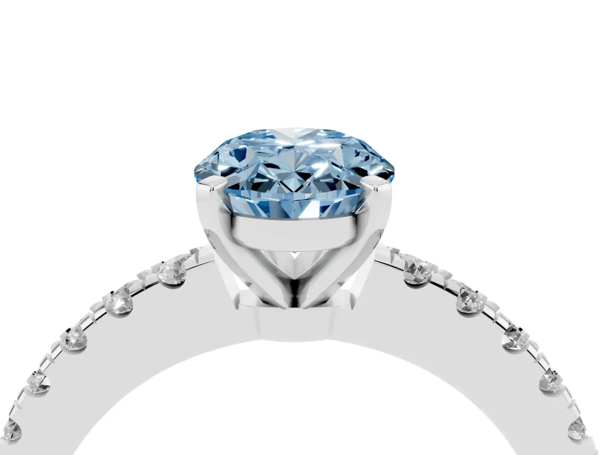 Fancy Blue Oval Cut Solitaire Diamond with Pavé Band and Four-Prong Setting Silver